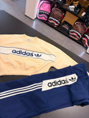 Tuta Adidas crop adiSignature fondo largo donna