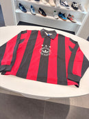 Polo Adidas a righe slavate nero