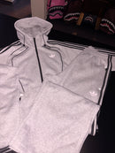 Tuta Adidas uomo grigia con zip logo retroriflettente