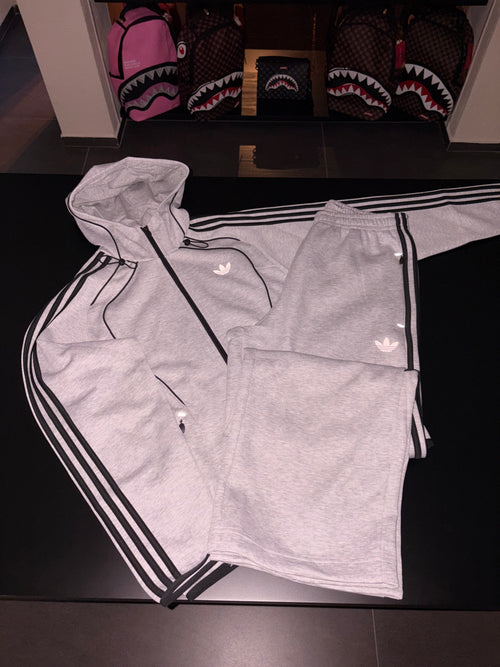 Tuta Adidas uomo grigia con zip logo retroriflettente