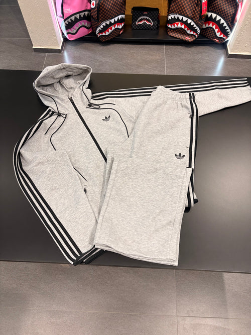 Tuta Adidas uomo grigia con zip logo retroriflettente