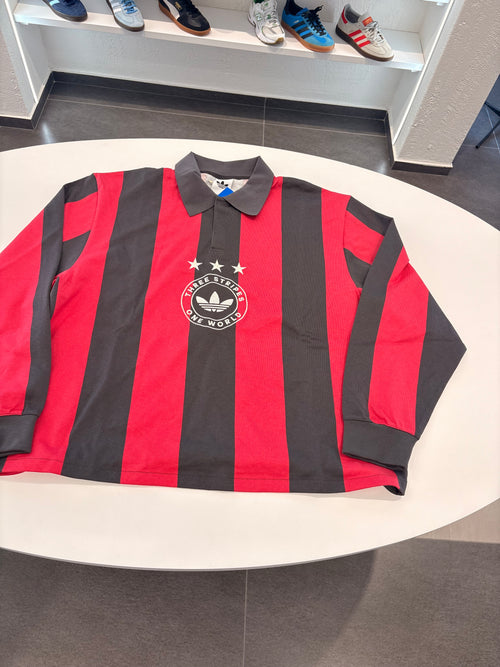Polo Adidas a righe slavate nero