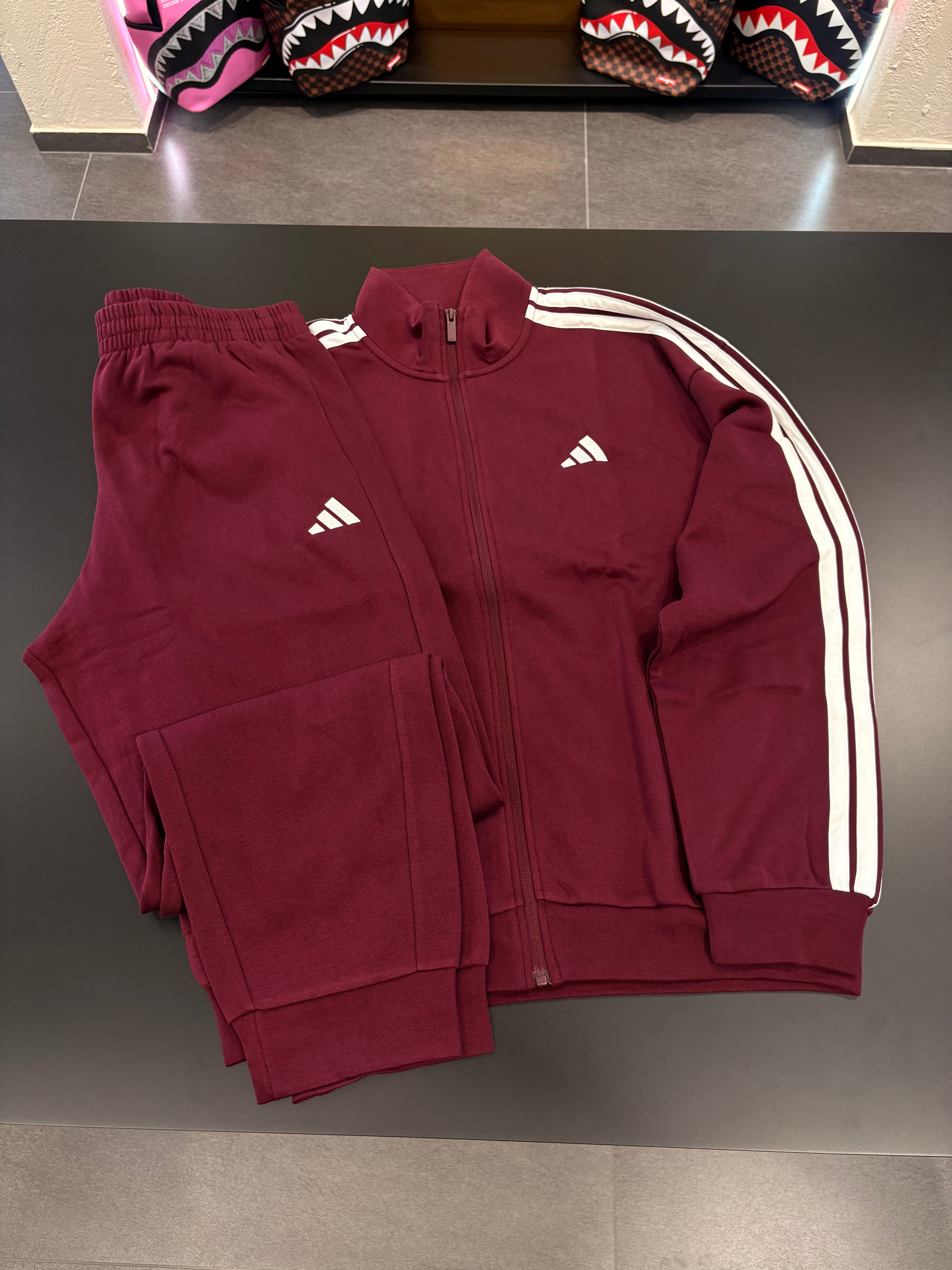 Tuta Adidas felpata bordeaux