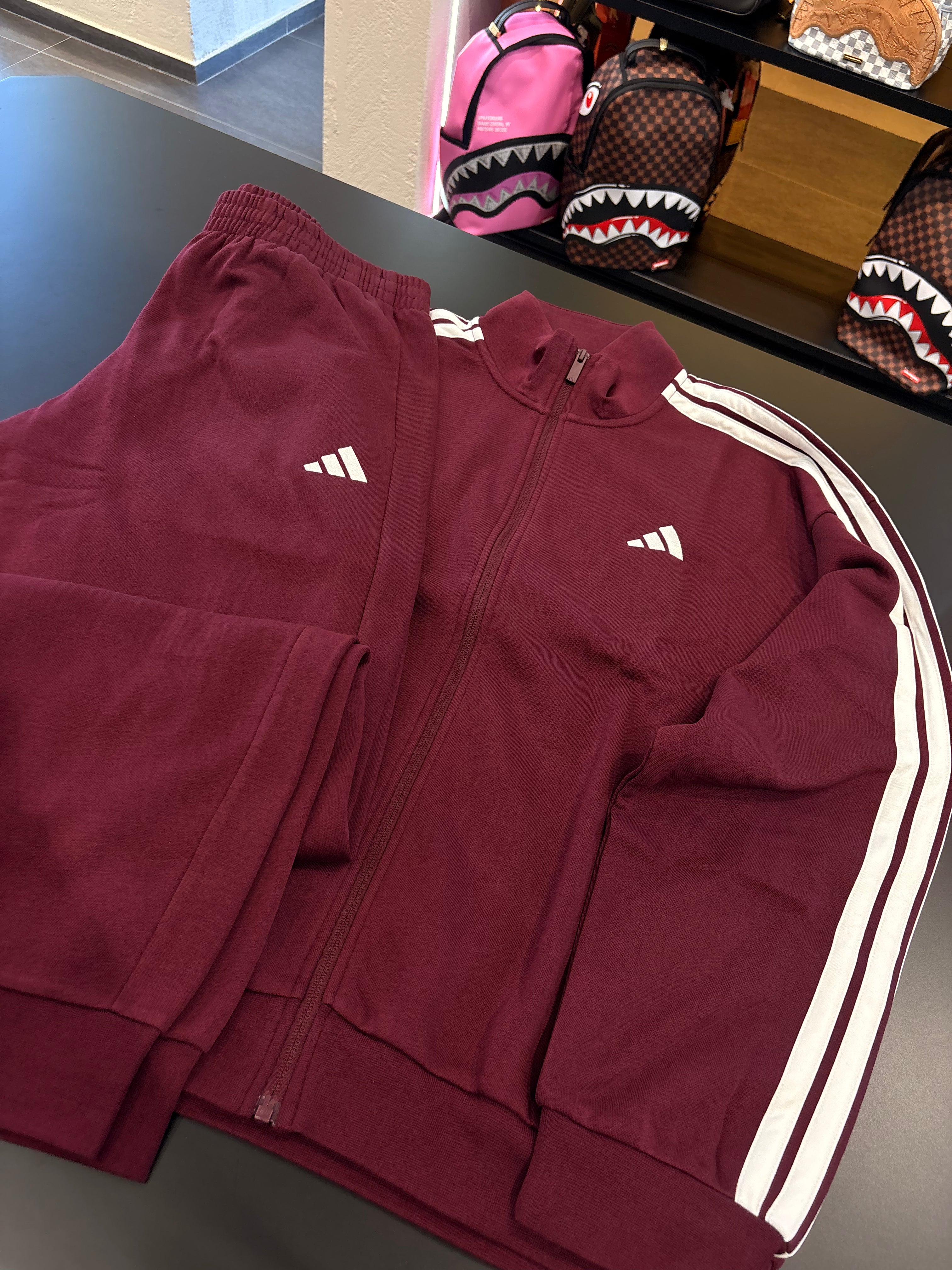 Tuta Adidas felpata bordeaux